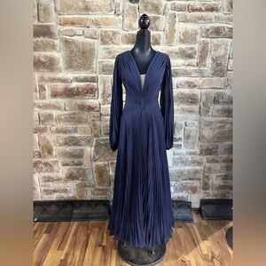 Formal Maxi Evening Gown (Color- Mulberry)
Accordion Pleated w/ Deep V Gown